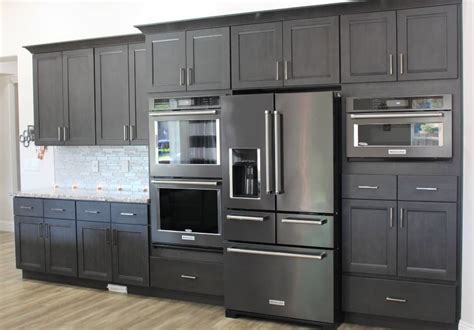 stainless steel fridge brown cabinet|gray stainless steel cabinet colors.